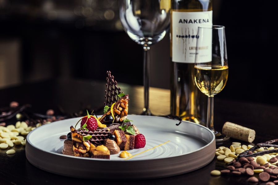 Chocolate dessert served with a glass of Anakena white
