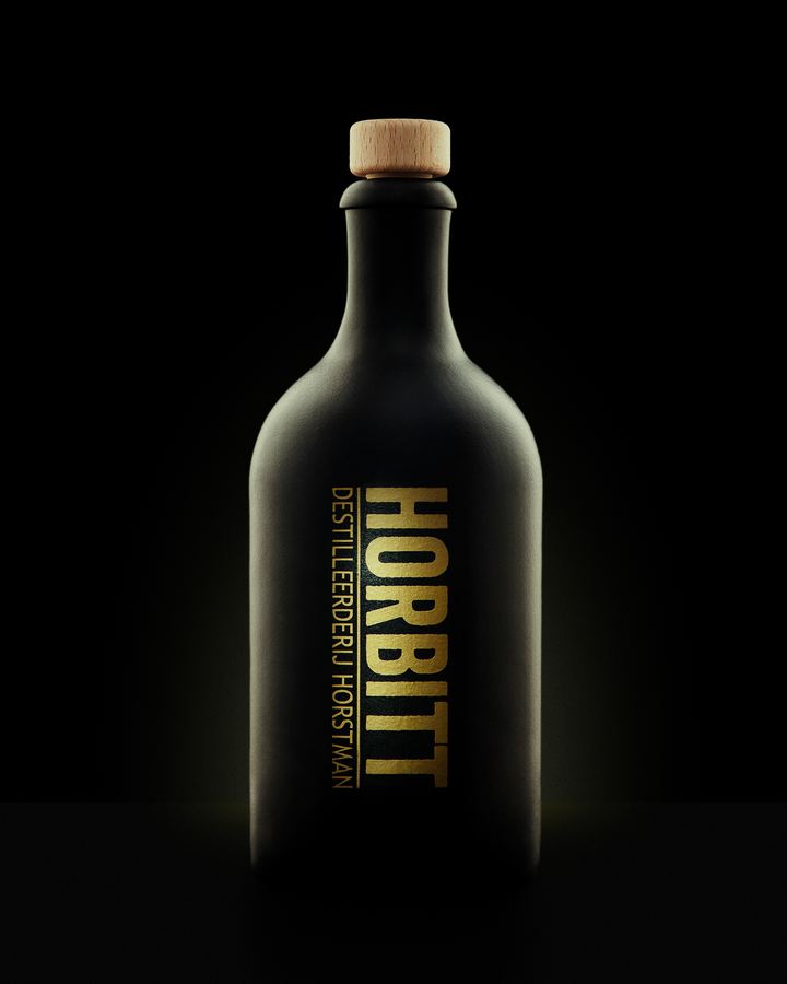 Horbitt in matte black stoneware, the gold lettering catching the light